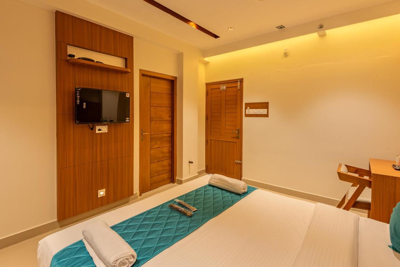 Hotel Stay Bella Кожикоде Экстерьер фото