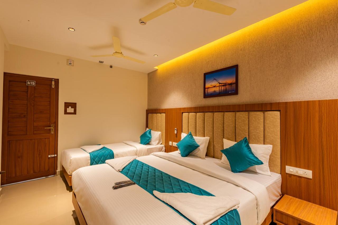 Hotel Stay Bella Кожикоде Экстерьер фото