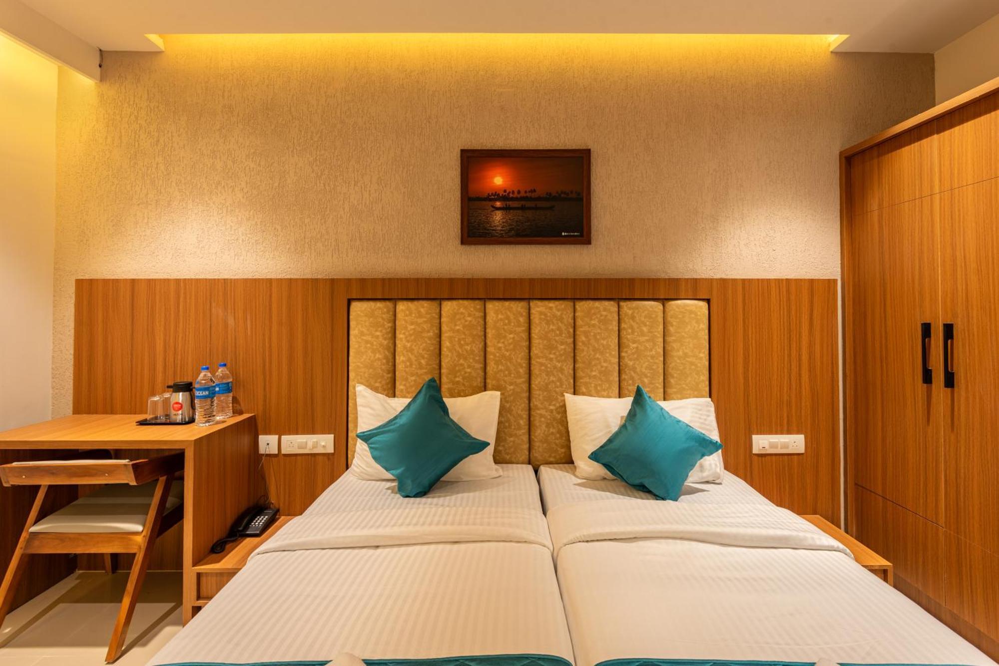 Hotel Stay Bella Кожикоде Экстерьер фото